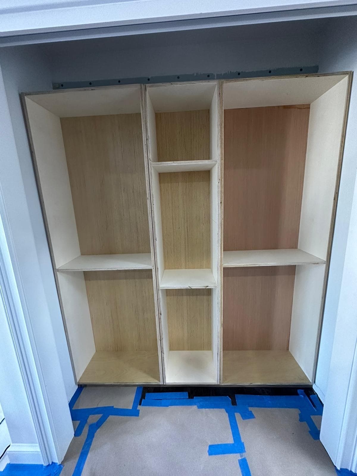 Custom walk-in closet shelving build-out